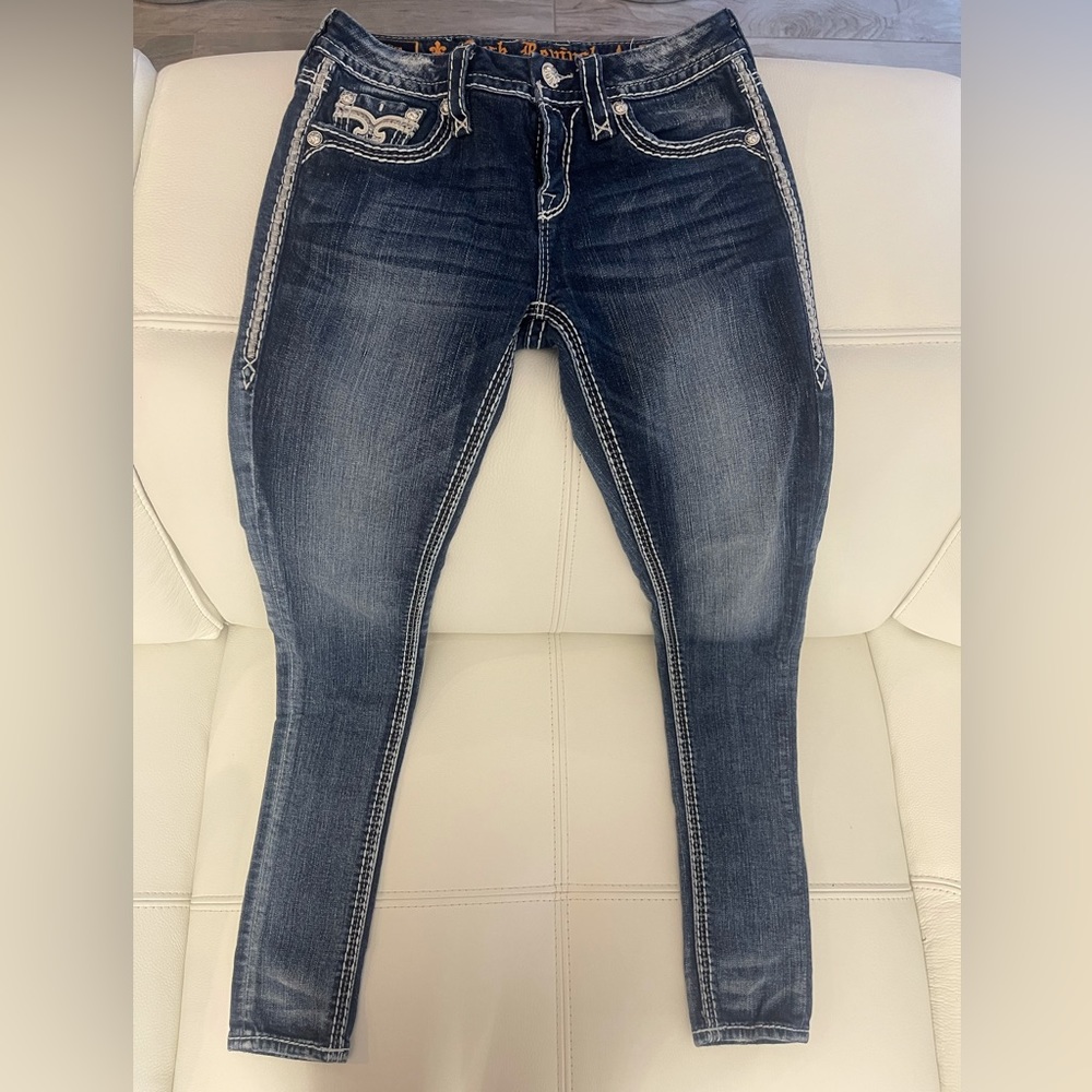 BUCKLE SKINNY JEANS